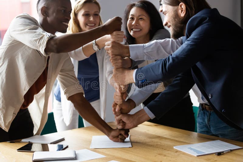 Happy employees celebrating team success